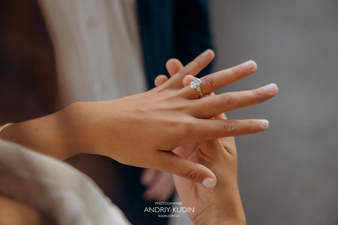 Romantic proposal by Lake Zurich with mountains in the background