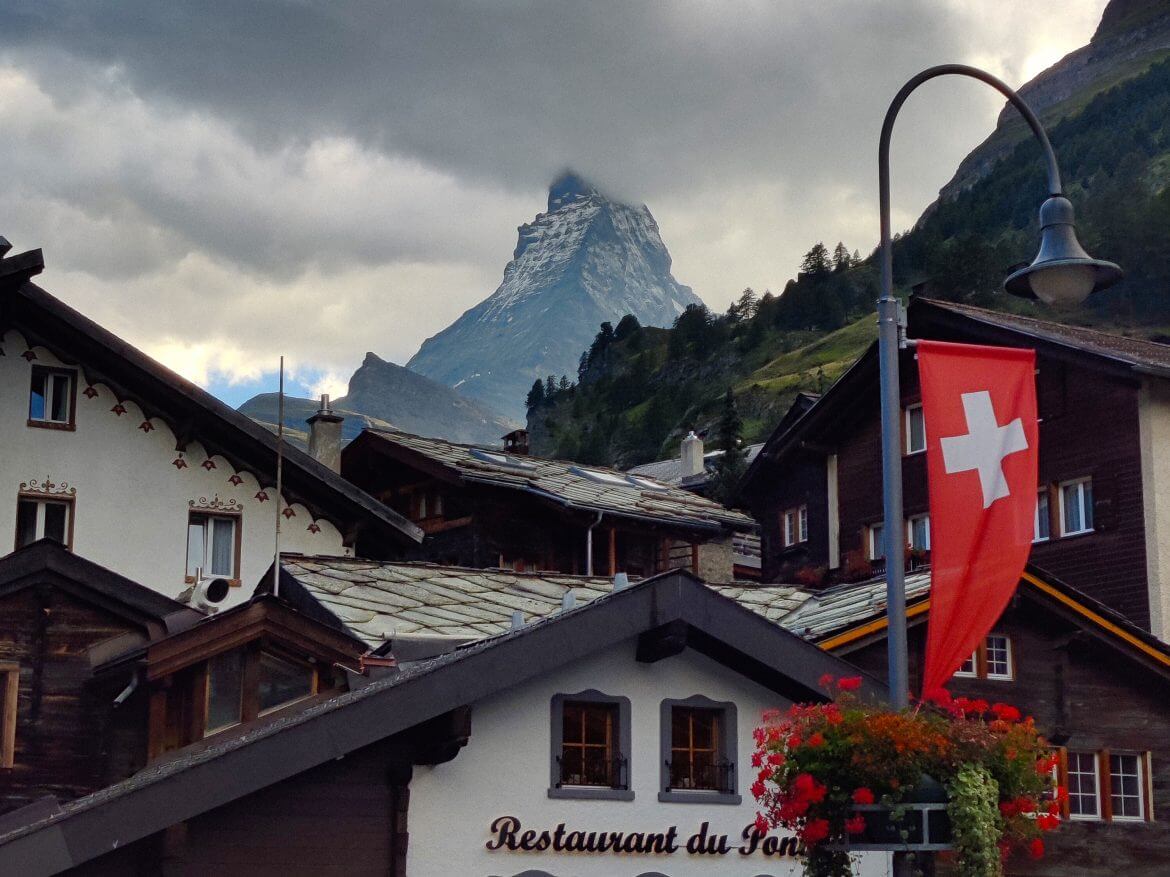 Adventure engagement session in the Swiss Alps near Zermatt for a destination proposal.