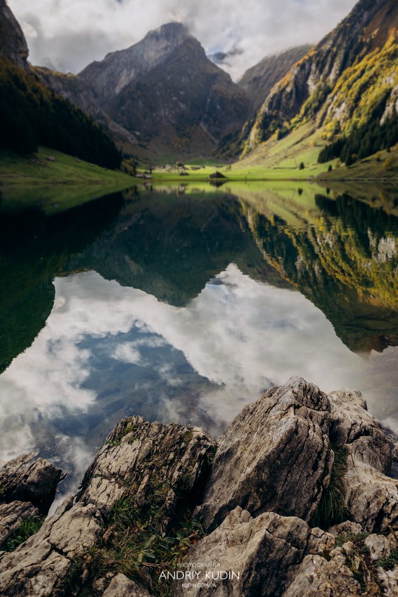 Luxury engagement photoshoot Switzerland by Seealpsee lake at sunset
