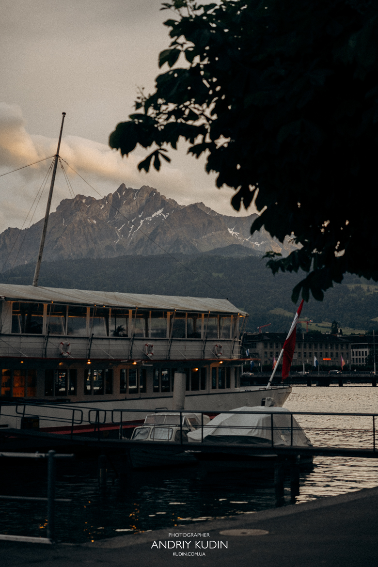 Romantic marriage proposal Switzerland on Lake Luzern shore at sunset