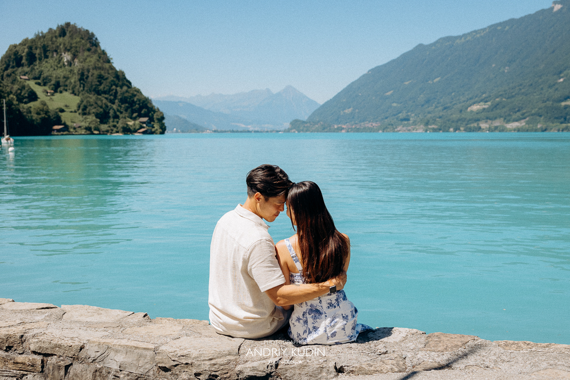Iseltwald wooden pier proposal with Bernese Alps in background. Marriage proposal photoshoot in Iseltwald, Switzerland. 