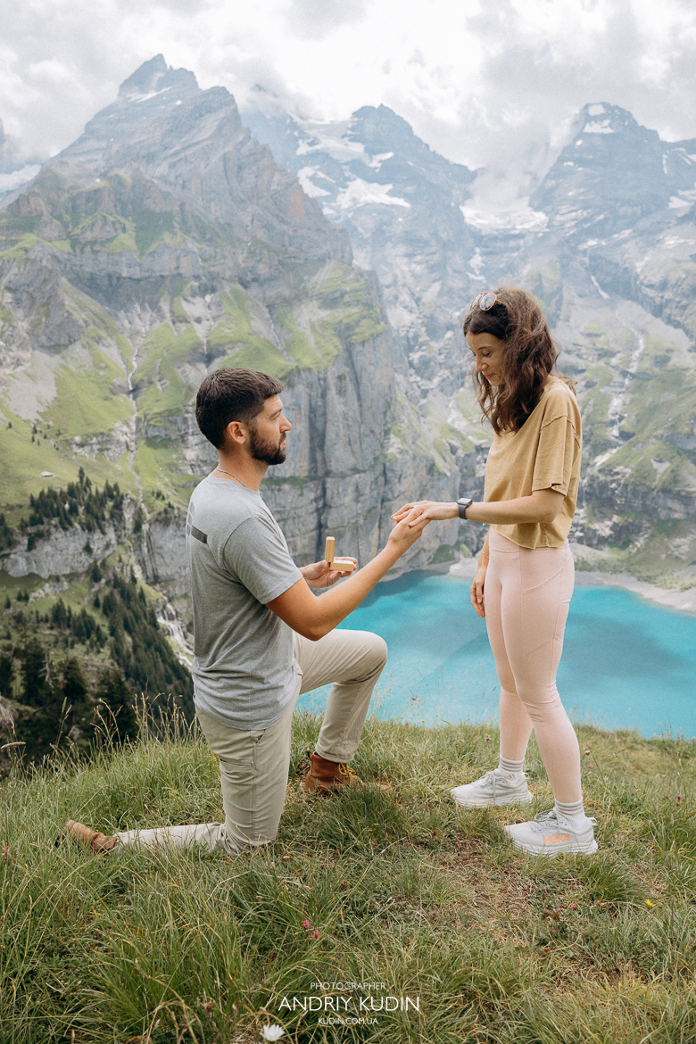 Couple-embracing-on-Oeschinensee-trail-during-golden-hour-shoot