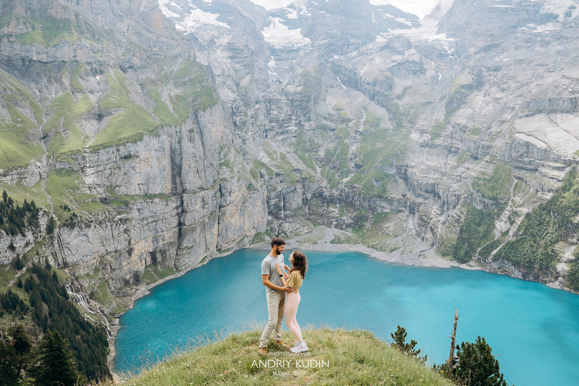 Romantic engagement moment at Lake Oeschinen Switzerland