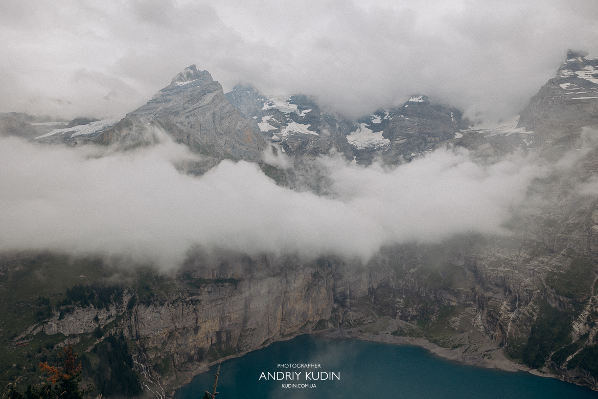 Emotional-proposal-at-Oeschinensee-lookout-with-snow-capped-Alps-background