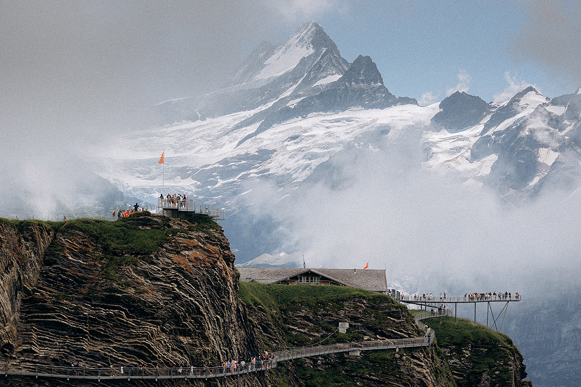 Propose on the First Cliff Walk, a thrilling platform with panoramic vistas, for an adventurous, scenic moment.