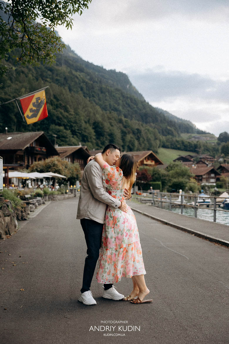 Intimate proposal scene by Iseltwald’s Lake Brienz with mountain views