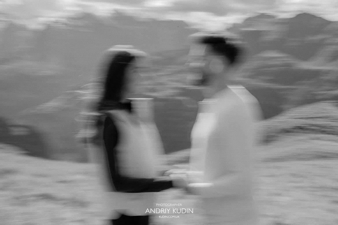 Couple proposal on mountain top Switzerland