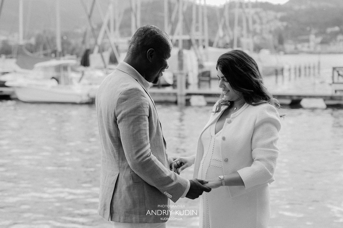 Man proposing on Zurich bridge with autumn foliage around, propose in zurich, zurich proposal