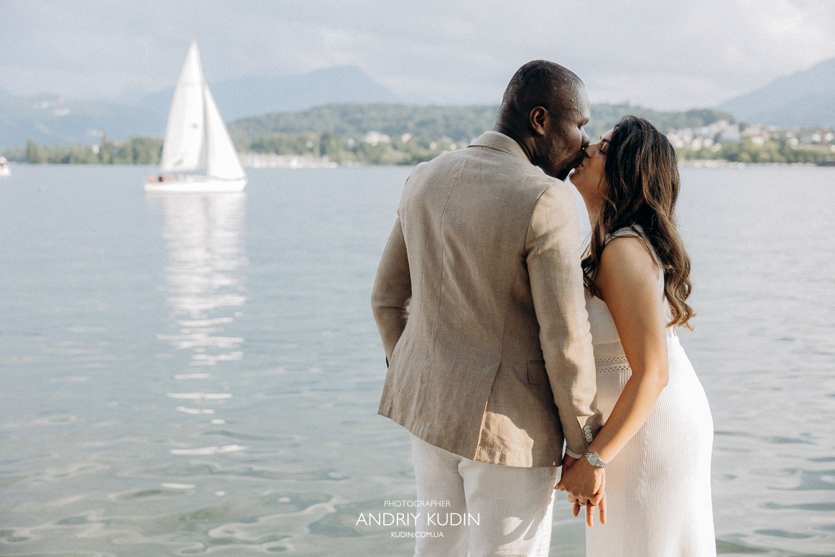 Romantic lakeside proposal with sailboats in the background, propose in zurich