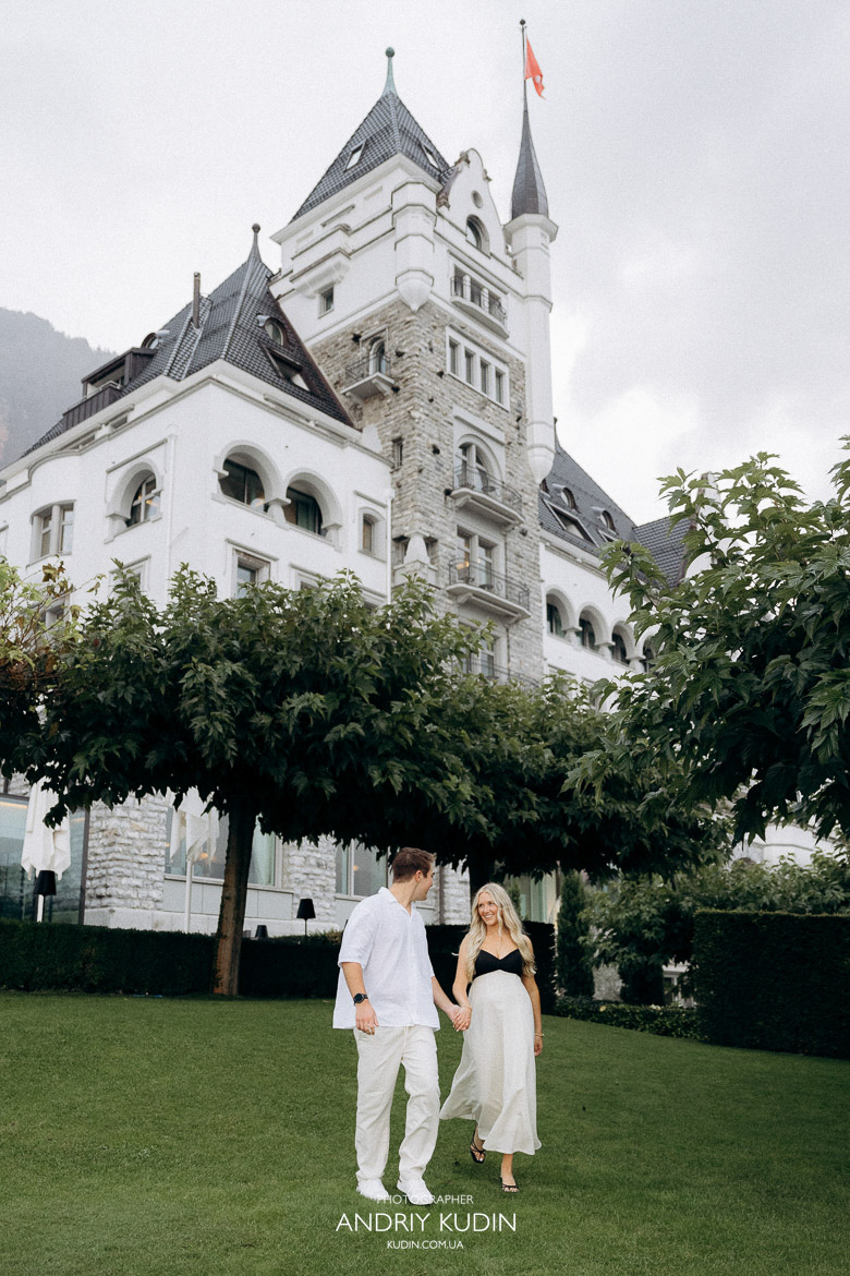 Engagement couple walking by Lake Lucerne after proposal