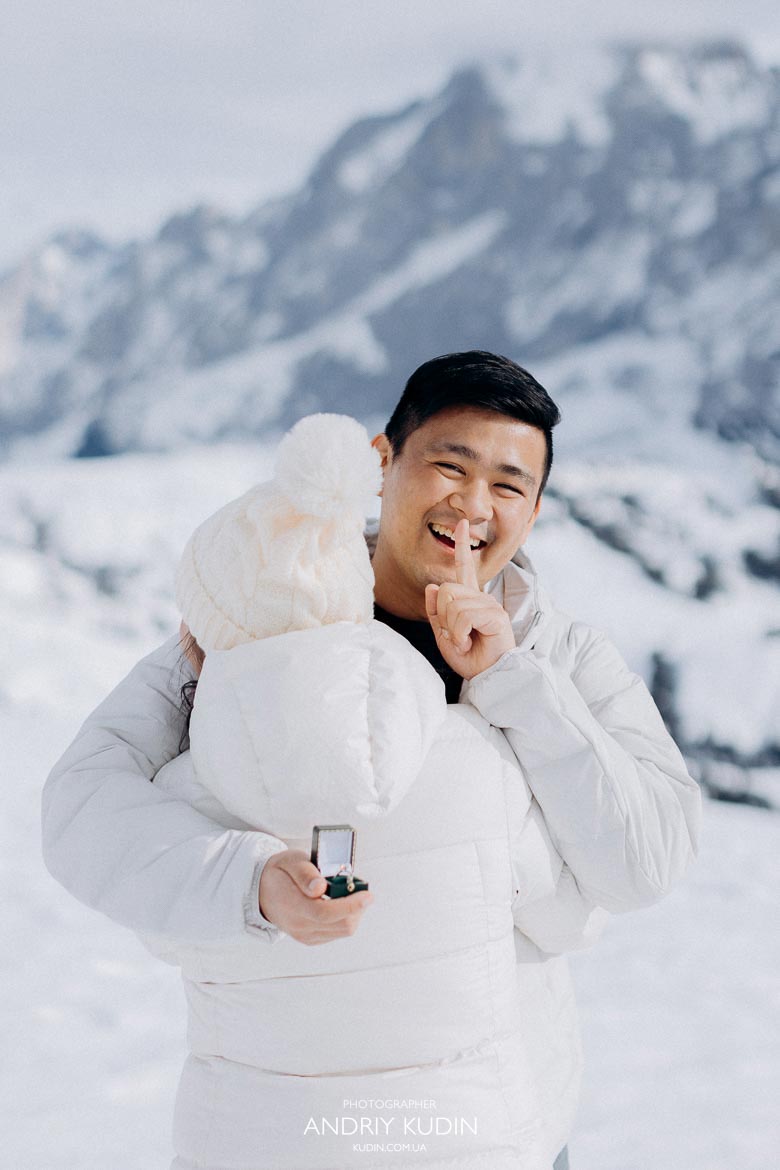 Romantic winter proposal in Grindelwald with alpine scenery