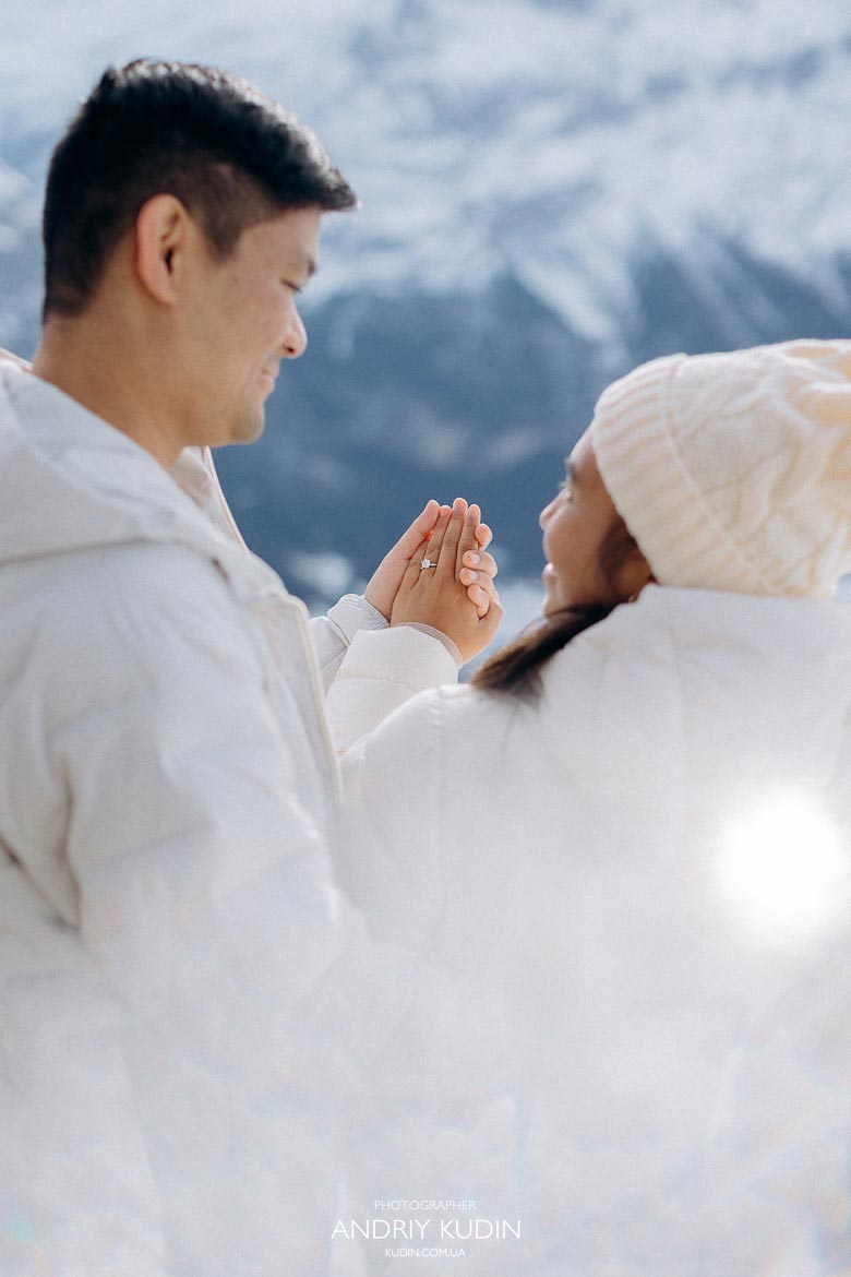 Romantic winter proposal in Grindelwald with alpine scenery