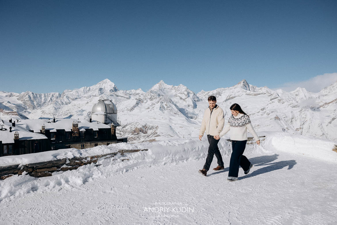 Warm winter accessories for a high-altitude photoshoot in Switzerland.