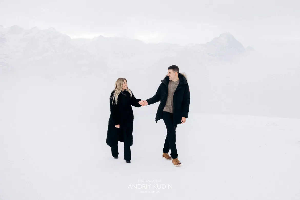 Engagement proposal with panoramic Swiss Alps views on Grindelwald First