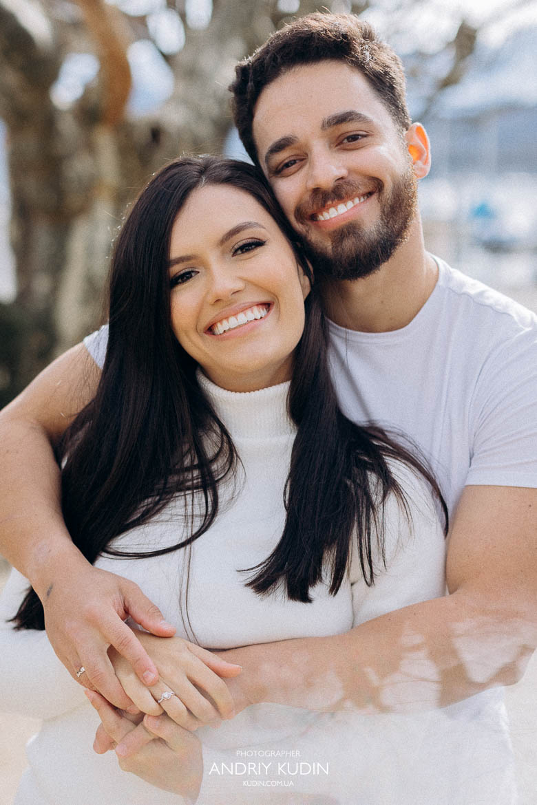 Romantic hug with Lake Lucerne and Alps after proposal in Luzern Romantic hug with Lake Lucerne and Alps after proposal in Luzern