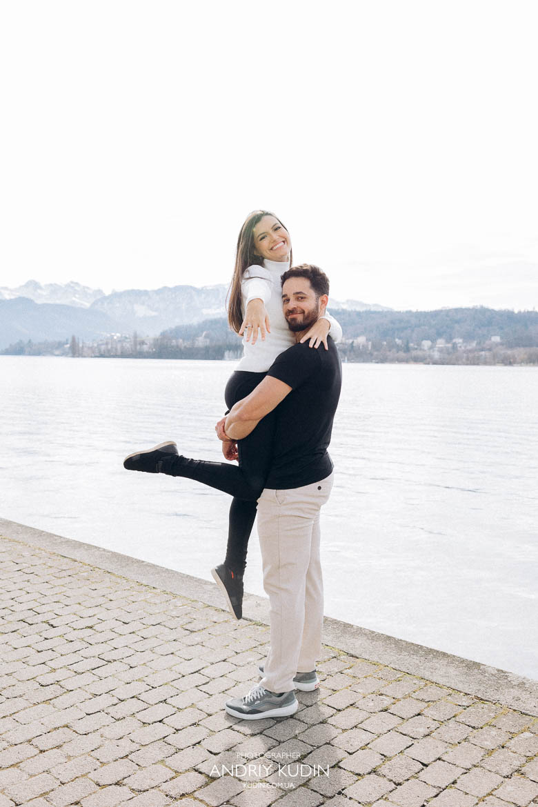 Emotional celebration with groom lifting bride-to-be after proposal in Luzern,Happy fiancée proudly showing her ring after surprise proposal in Luzern Emotional celebration with groom lifting bride-to-be after proposal in Luzern,Happy fiancée proudly showing her ring after surprise proposal in Luzern