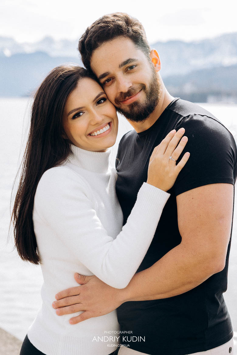 Tender embrace of engaged couple after surprise proposal in Luzern Tender embrace of engaged couple after surprise proposal in Luzern