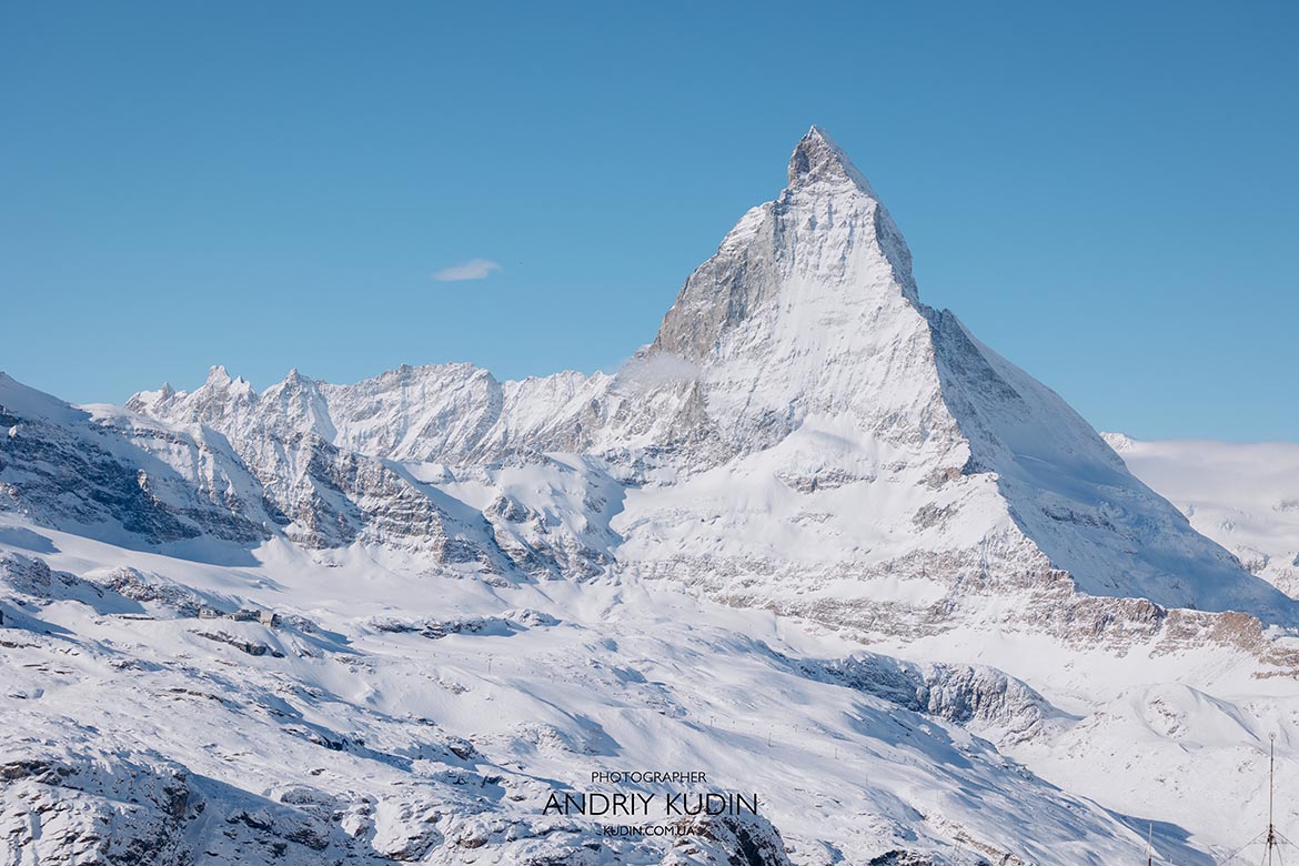 Zermatt proposal with snowy mountains and clear blue skies.