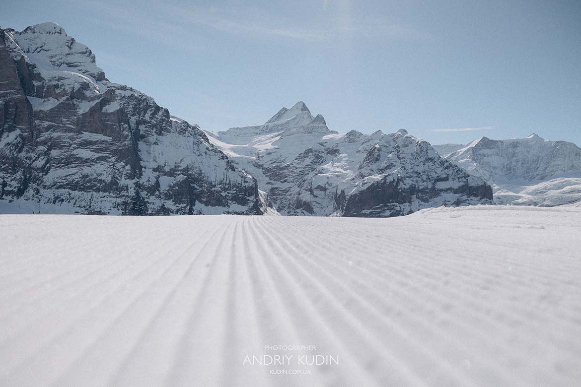 snowy Alps romantic couple moment, winter proposal Swiss mountains