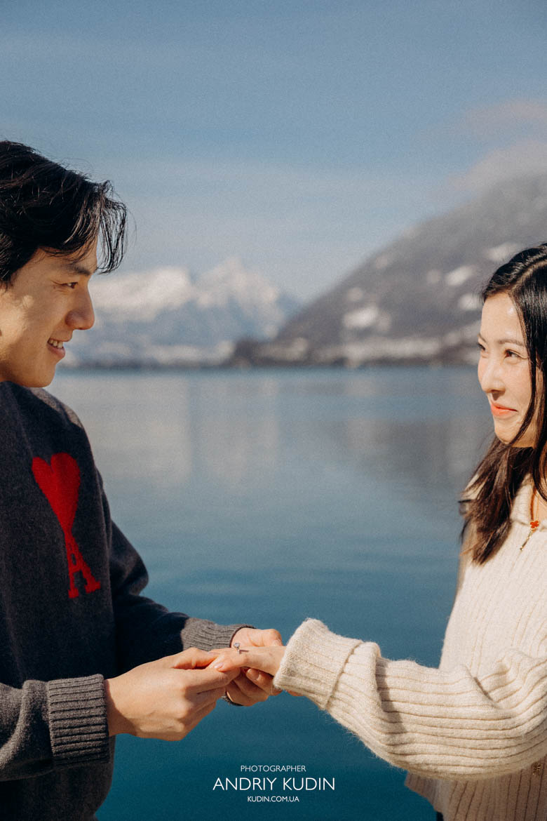 Emotional reaction during marriage proposal in Iseltwald Switzerland with alpine scenery Emotional reaction during marriage proposal in Iseltwald Switzerland with alpine scenery