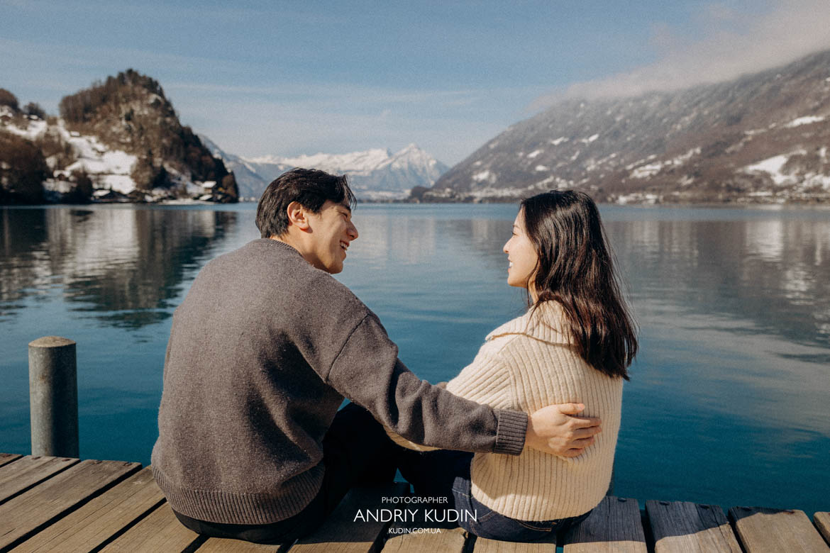 Romantic scenery during proposal in Switzerland at Iseltwald village by the lake
