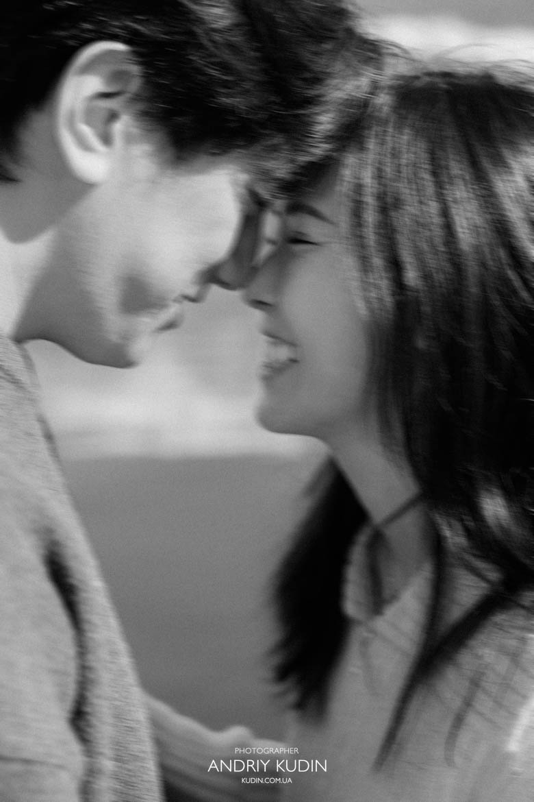 Couple smiling after she said yes during proposal in Iseltwald Switzerland