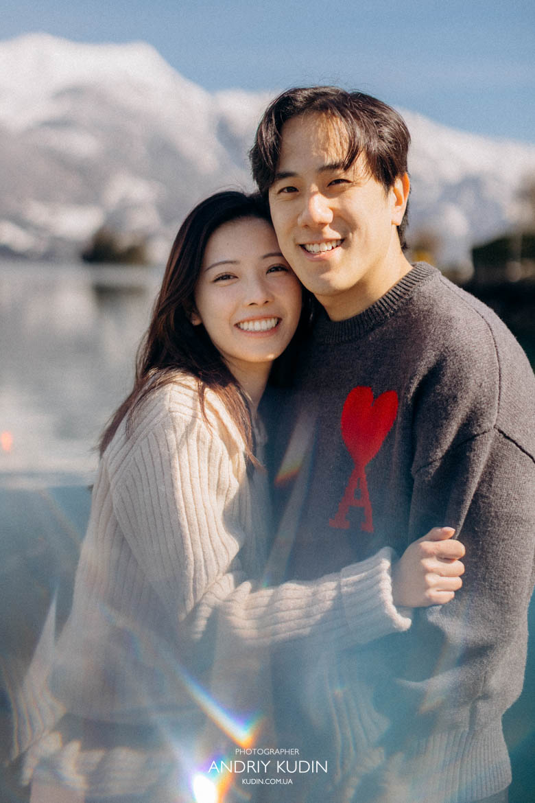 Couple smiling after she said yes during proposal in Iseltwald Switzerland Couple smiling after she said yes during proposal in Iseltwald Switzerland