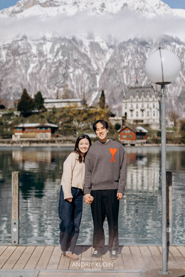 Surprise engagement captured naturally during proposal in Switzerland at Iseltwald