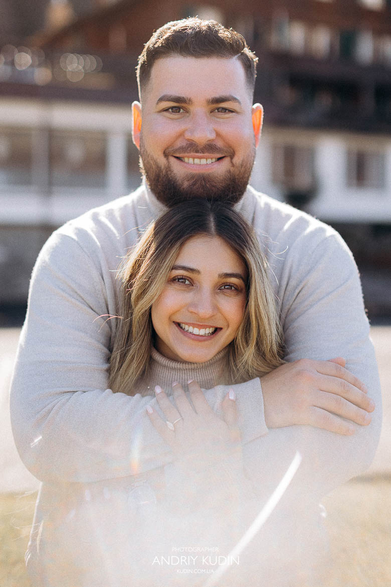 Romantic couple standing hand in hand after proposal in Iseltwald, 스위스 프로포즈 성공