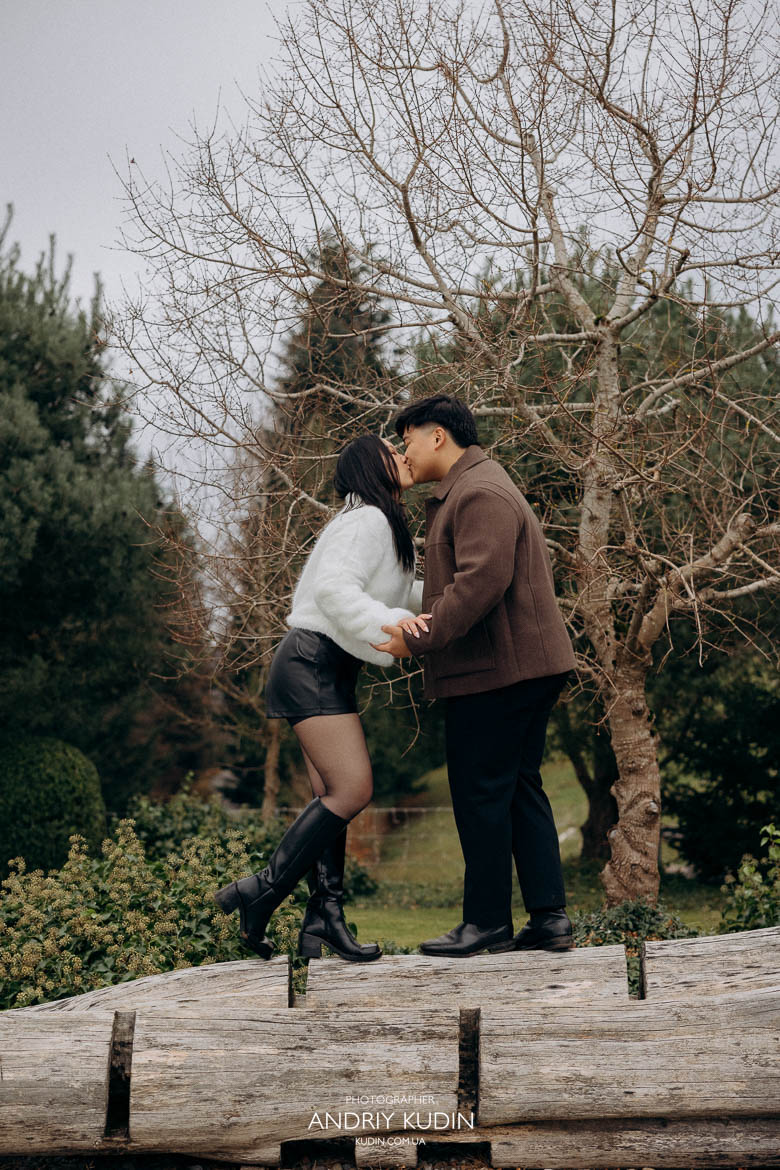 switzerland proposal photographer capturing lake lucerne proposal with couple joking, holding hands and enjoying romantic walk