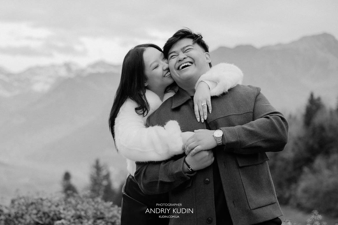 switzerland proposal spots lake lucerne with couple laughing and smiling after lucerne proposal, enjoying love and freedom