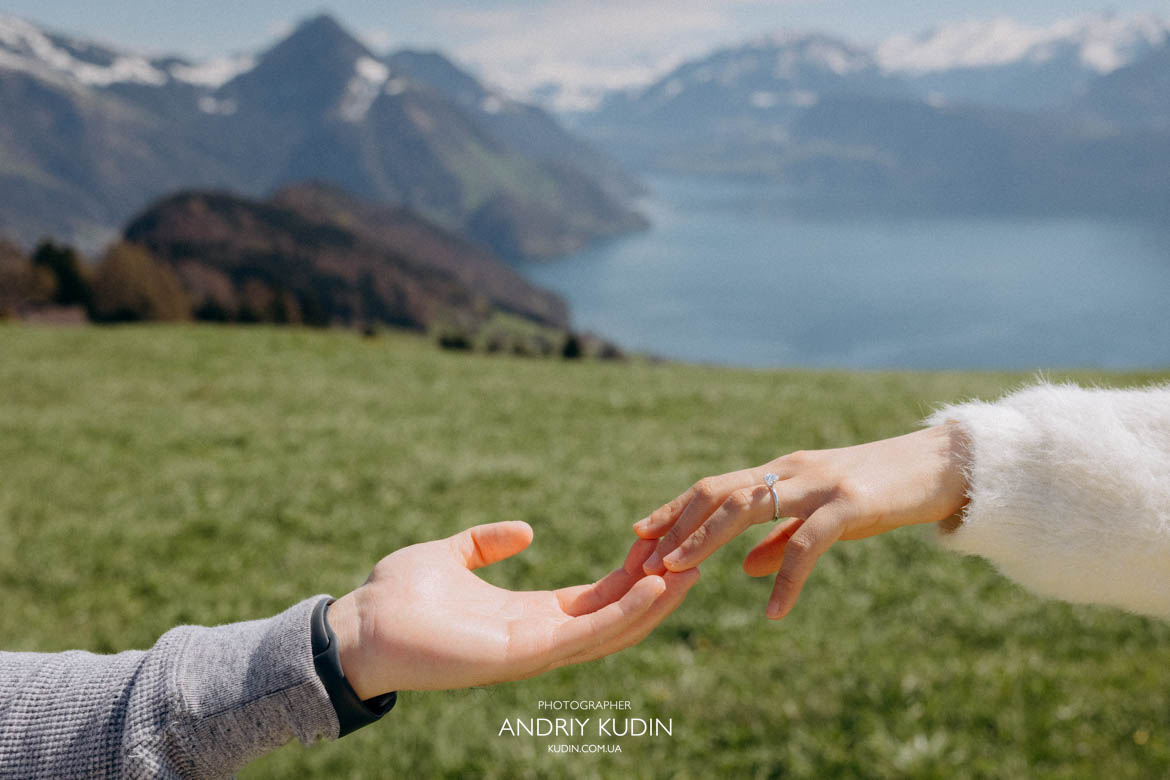 Ring moment captured during proposal at Villa Honegg Engagement ring scene with mountain view Switzerland