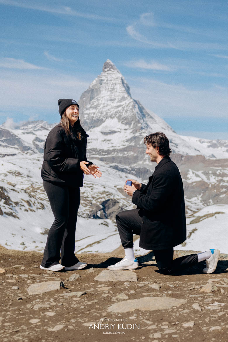 zermatt proposal with matterhorn mountain background, man on one knee proposing matterhorn view