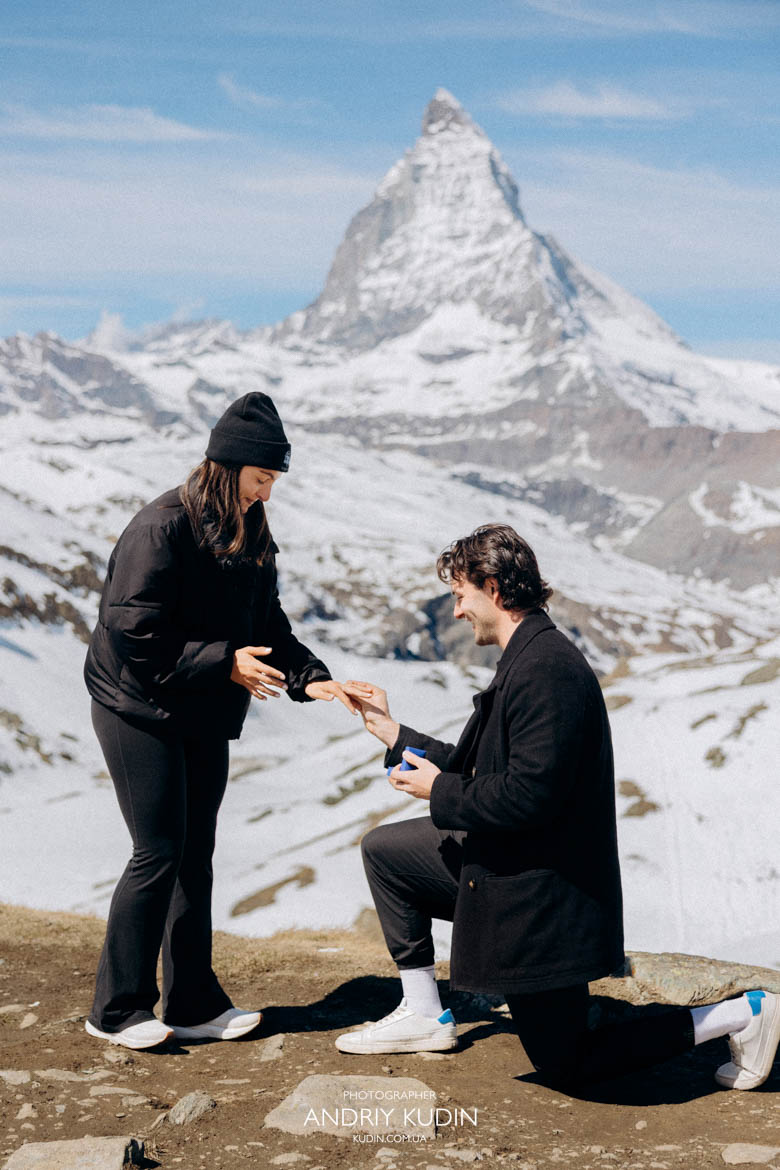 engagement ring moment switzerland proposal, couple hugging after proposal matterhorn