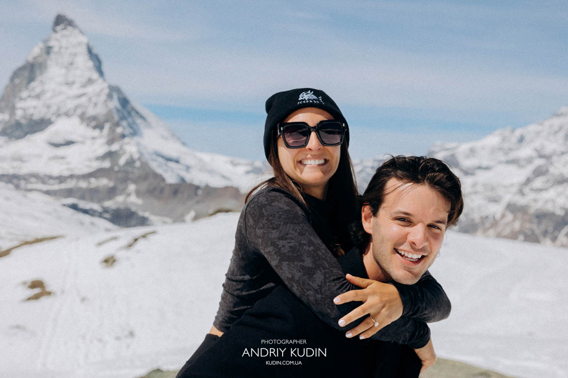 couple smiling proposal matterhorn background