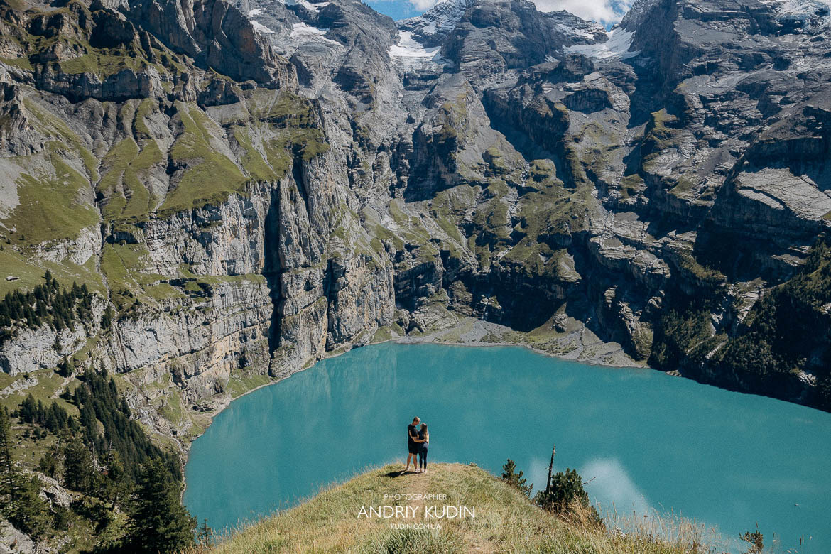 Happy couple after surprise proposal at Lake Oeschinensee Switzerland proposal photographer capturing romantic mountain engagement Happy couple after surprise proposal at Lake Oeschinensee Switzerland proposal photographer capturing romantic mountain engagement
