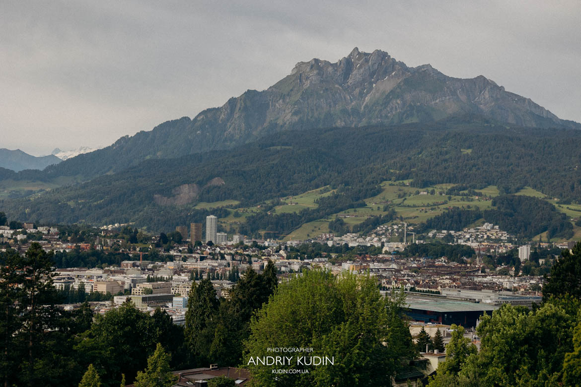 Breathtaking panoramic view of Mount Pilatus framing a romantic couple in Lucerne. Lucerne hilltop park offering an incredible vantage point of Lake Lucerne and the Swiss Alps. Breathtaking panoramic view of Mount Pilatus framing a romantic couple in Lucerne. Lucerne hilltop park offering an incredible vantage point of Lake Lucerne and the Swiss Alps.