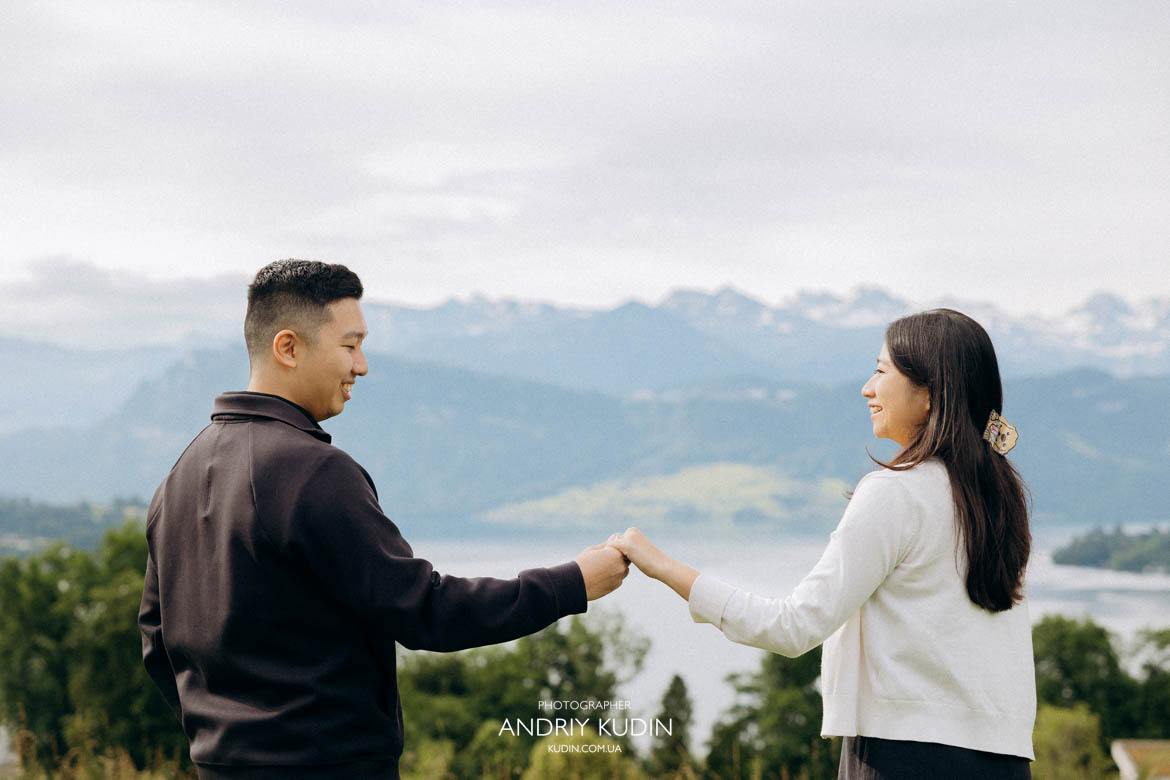 Emotional sunrise engagement session with a panoramic view of the historic towers of Lucerne. Emotional sunrise engagement session with a panoramic view of the historic towers of Lucerne.