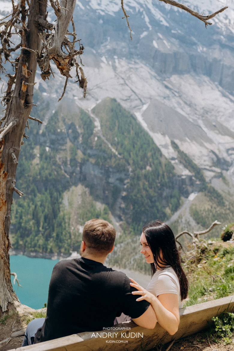 Authentic emotions during an Oeschinensee romantic proposal before noon.