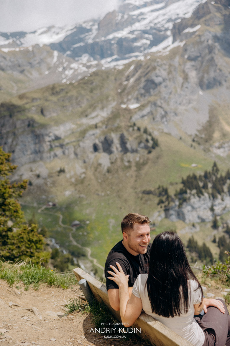 Authentic emotions during an Oeschinensee romantic proposal before noon.