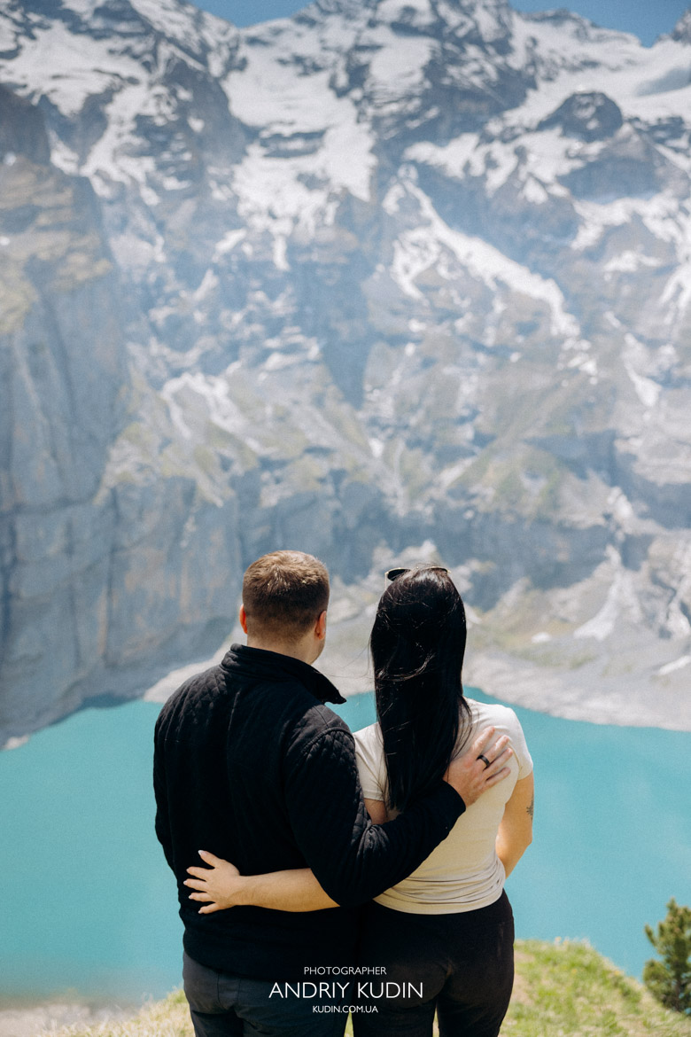 Emotional bride-to-be during a surprise Oeschinensee engagement shoot.