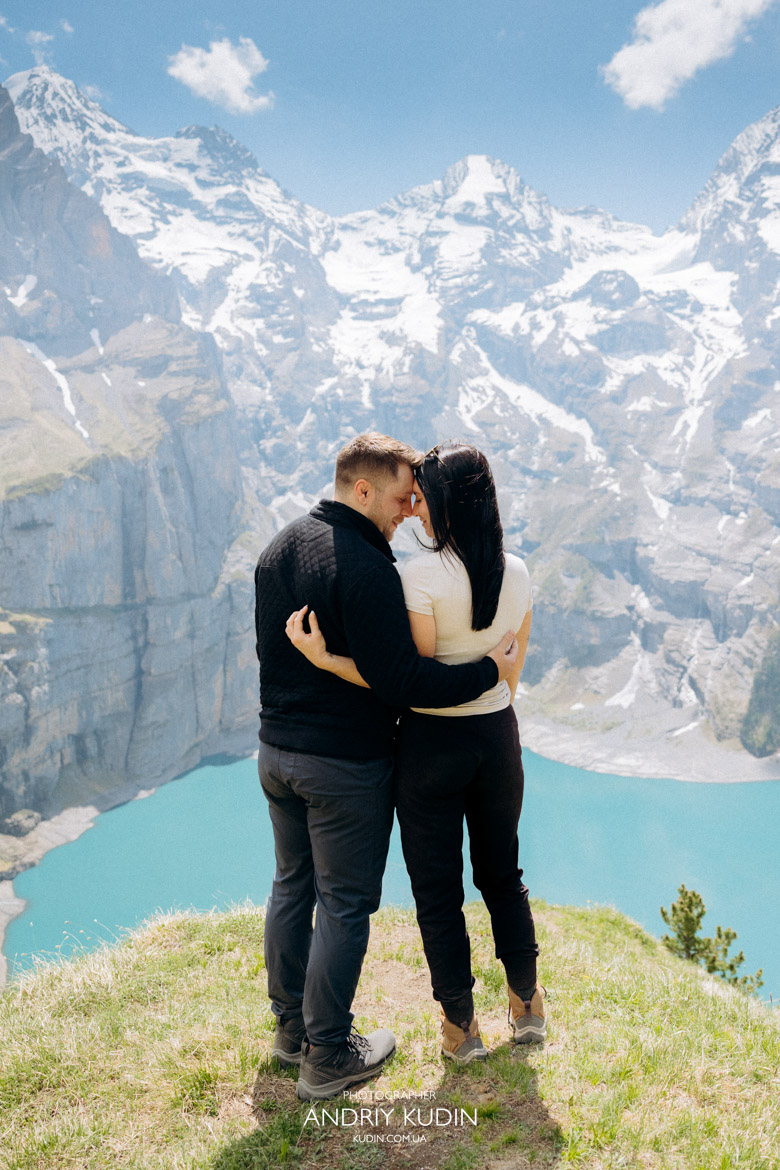 Emotional bride-to-be during a surprise Oeschinensee engagement shoot.