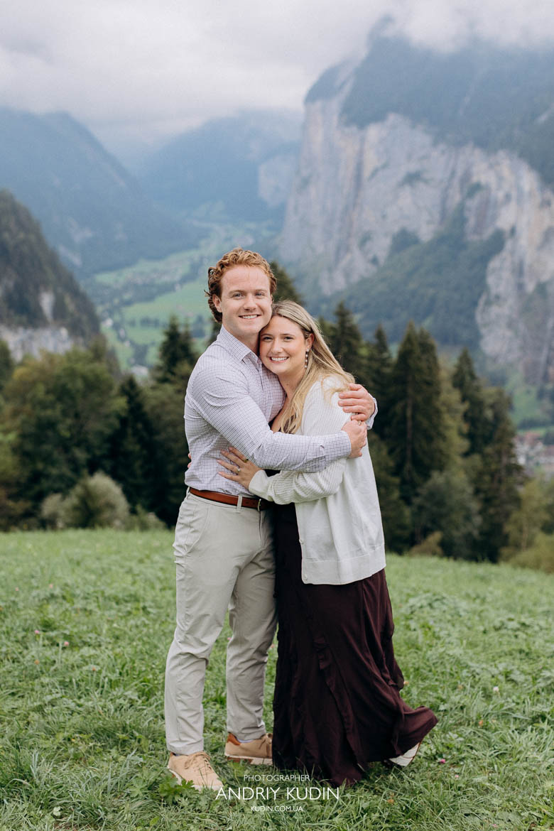 Romantic proposal by Lauterbrunnen waterfalls. Switzerland proposal photographer.