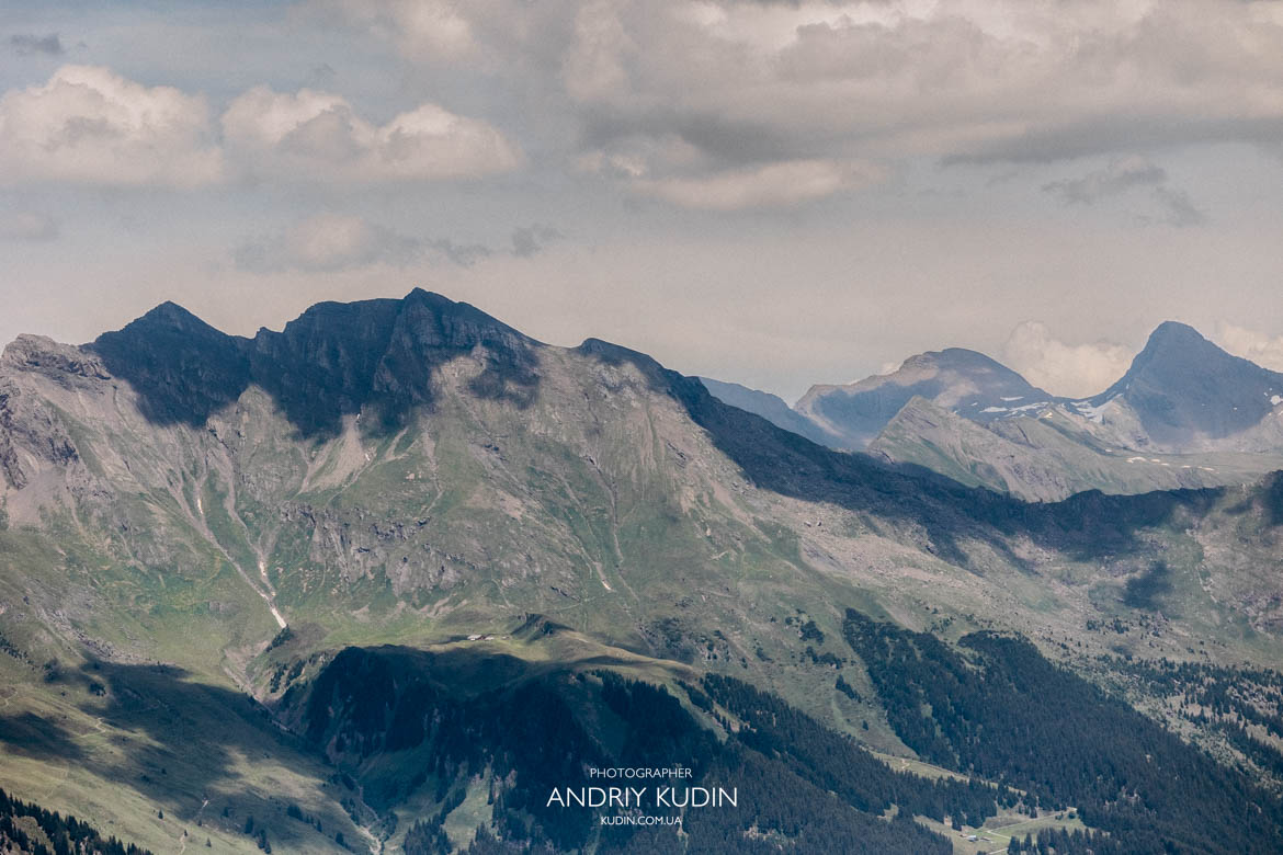 Switzerland proposal photographer photographing a surprise engagement. Interlaken proposal on scenic mountain trails.