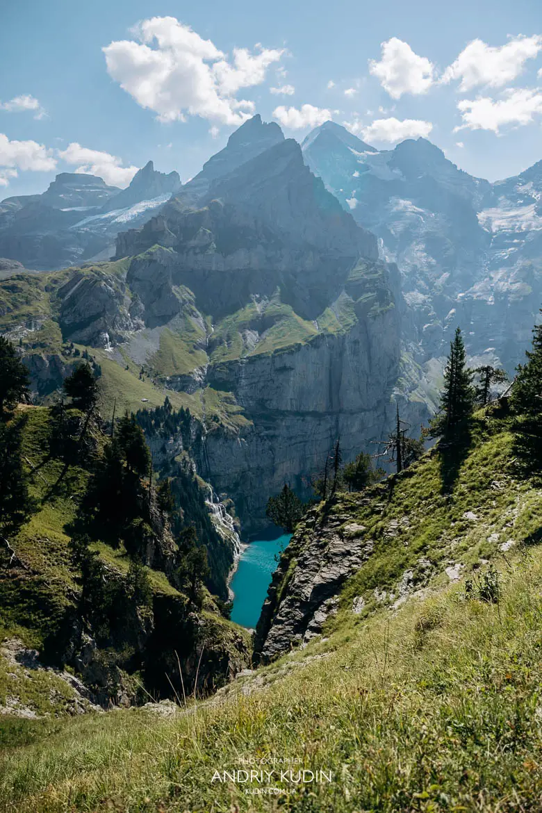 Scenic alpine hiking trail view along Heuberg route toward Lake Oeschinensee in Switzerland