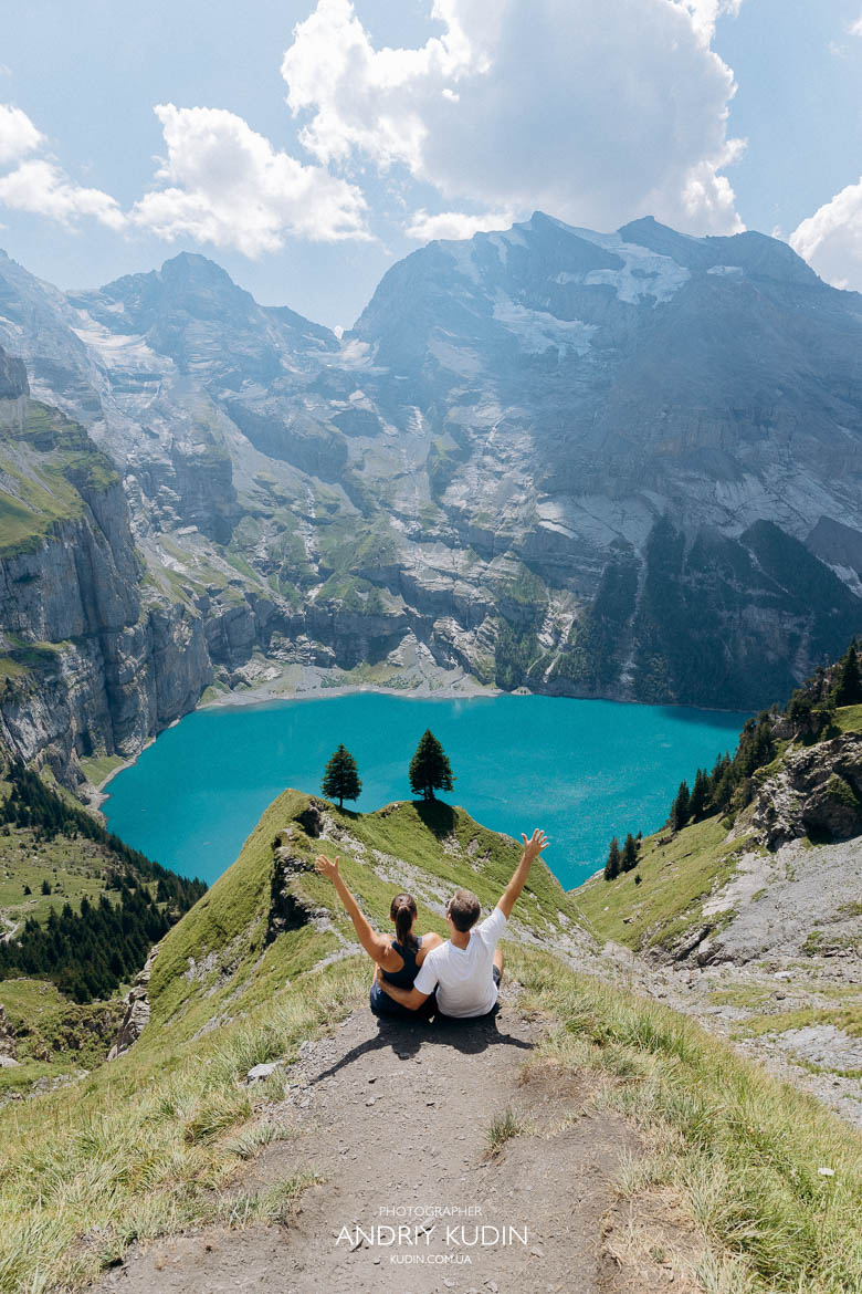 Wide-angle view of proposal at Oeschinensee Wide-angle view of a surprise proposal on a mountain viewpoint overlooking turquoise Oeschinensee by switzerland proposal photographer