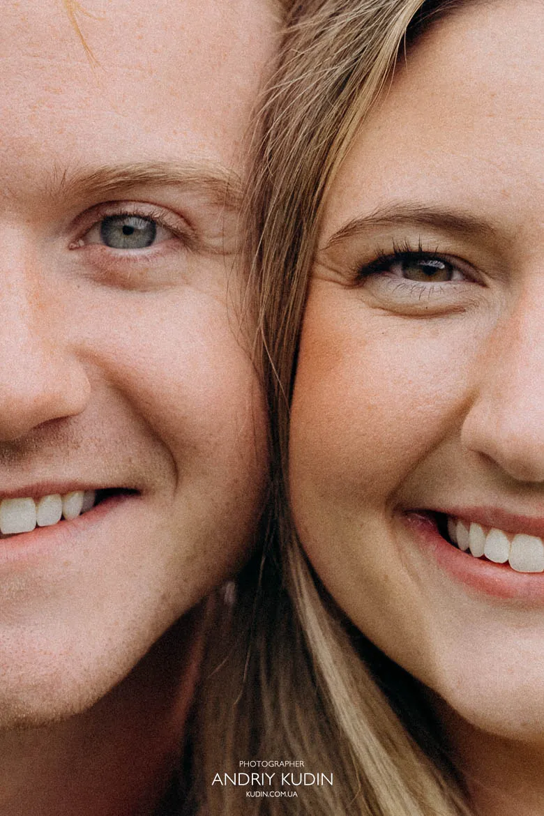 Close-up portrait of smiling engaged couple during proposal session in Lauterbrunnen. Photo by switzerland proposal photographer.