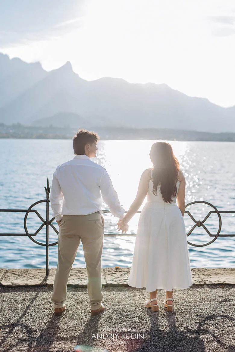 Interlaken proposal photoshoot on Lake Thun shoreline in Switzerland.